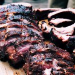 Barbecue Ribs on a wooden cutting board